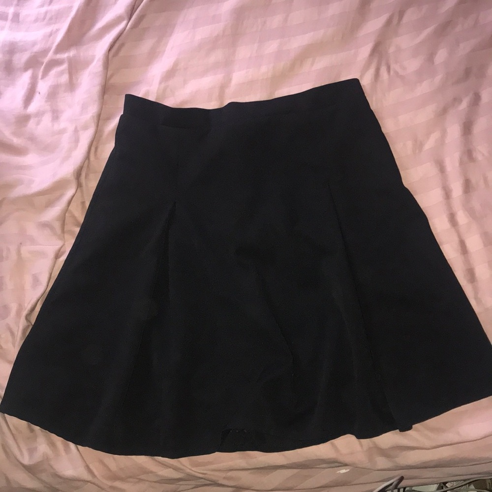 Small black skirt.
